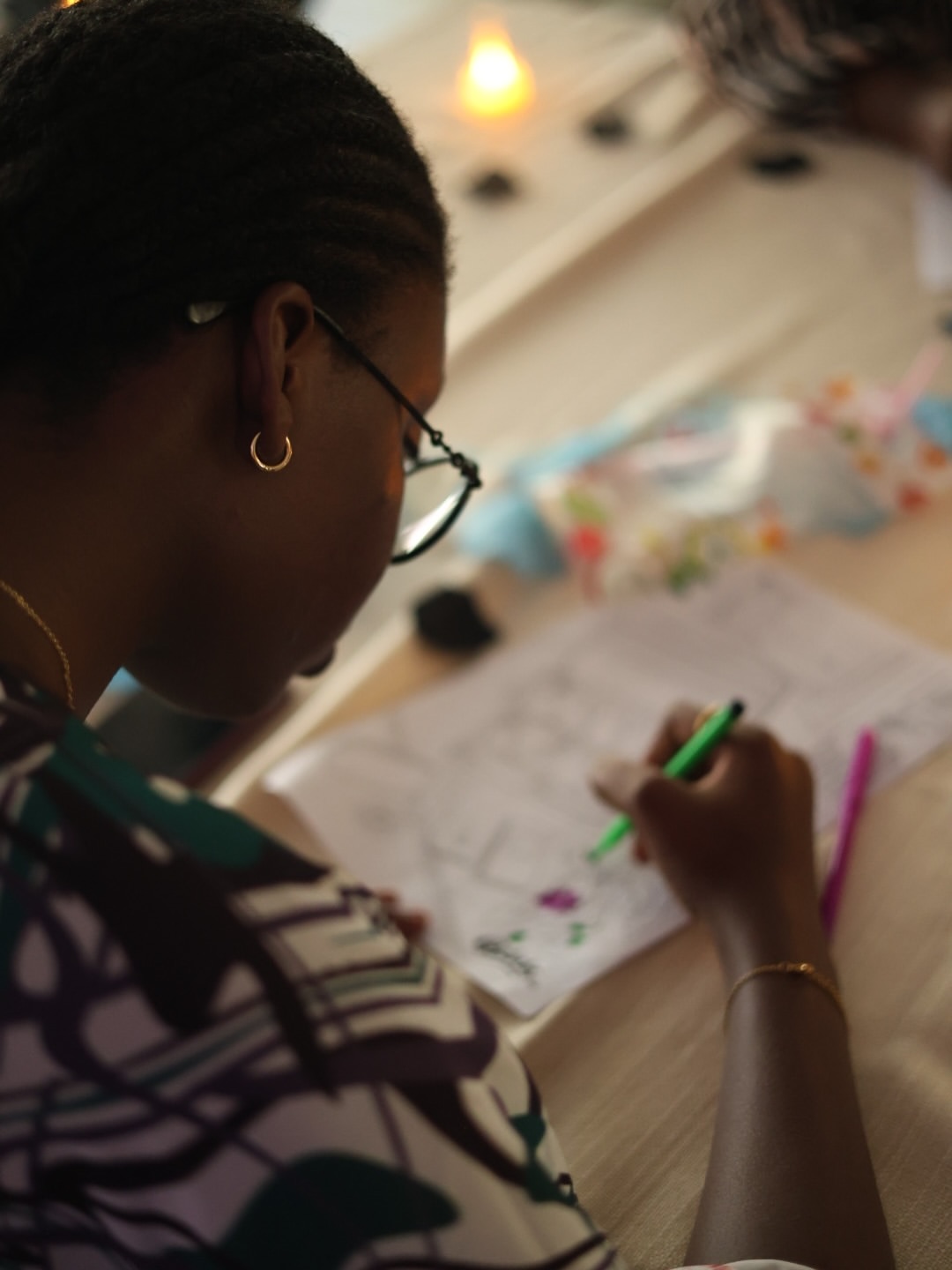 Attendee journaling during a Glow Circle session