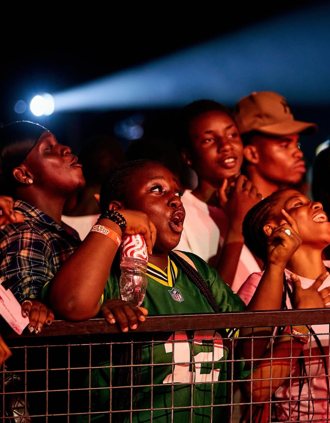 Festival crowd at the front barricade during a Shakara Festival set